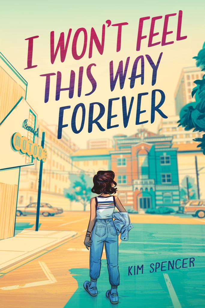I Won’t Feel This Way Forever by Kim Spencer. An illustration of a young person standing at the intersection of a big city street.