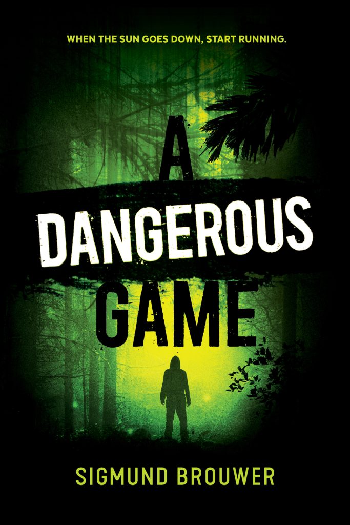 A Dangerous Game by Sigmund Brouwer. When the sun goes down, start running. A dark green-tinged forest with a solitary figure silhouetted by a glowing yellow light.